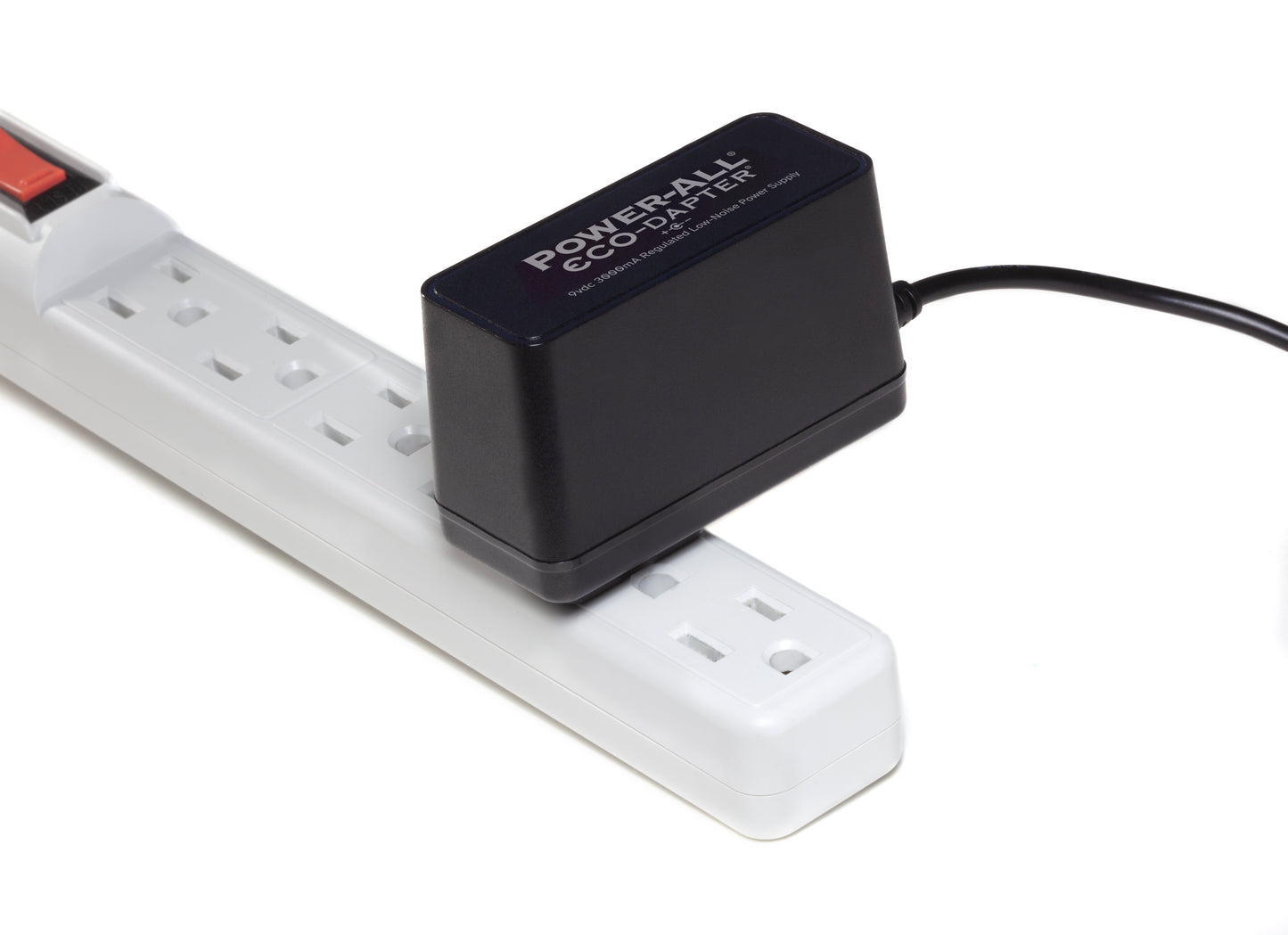 Power-All ECO-Dapter 3000mA 9vdc Power Supply for Guitar Effect Pedals plugged into one spot on a power strip