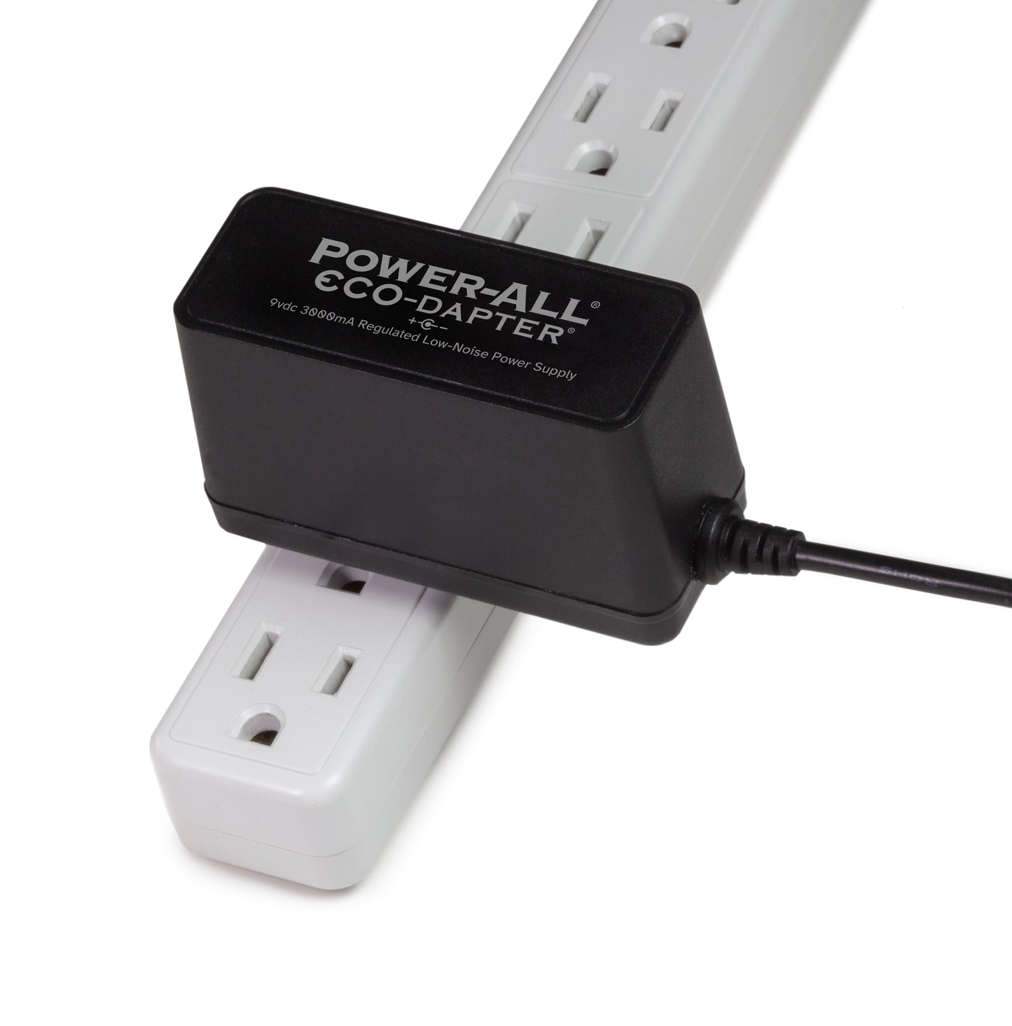 Power-All ECO-Dapter 3000mA 9vdc Power Supply for Guitar Effect Pedals plugged into one spot on a power strip
