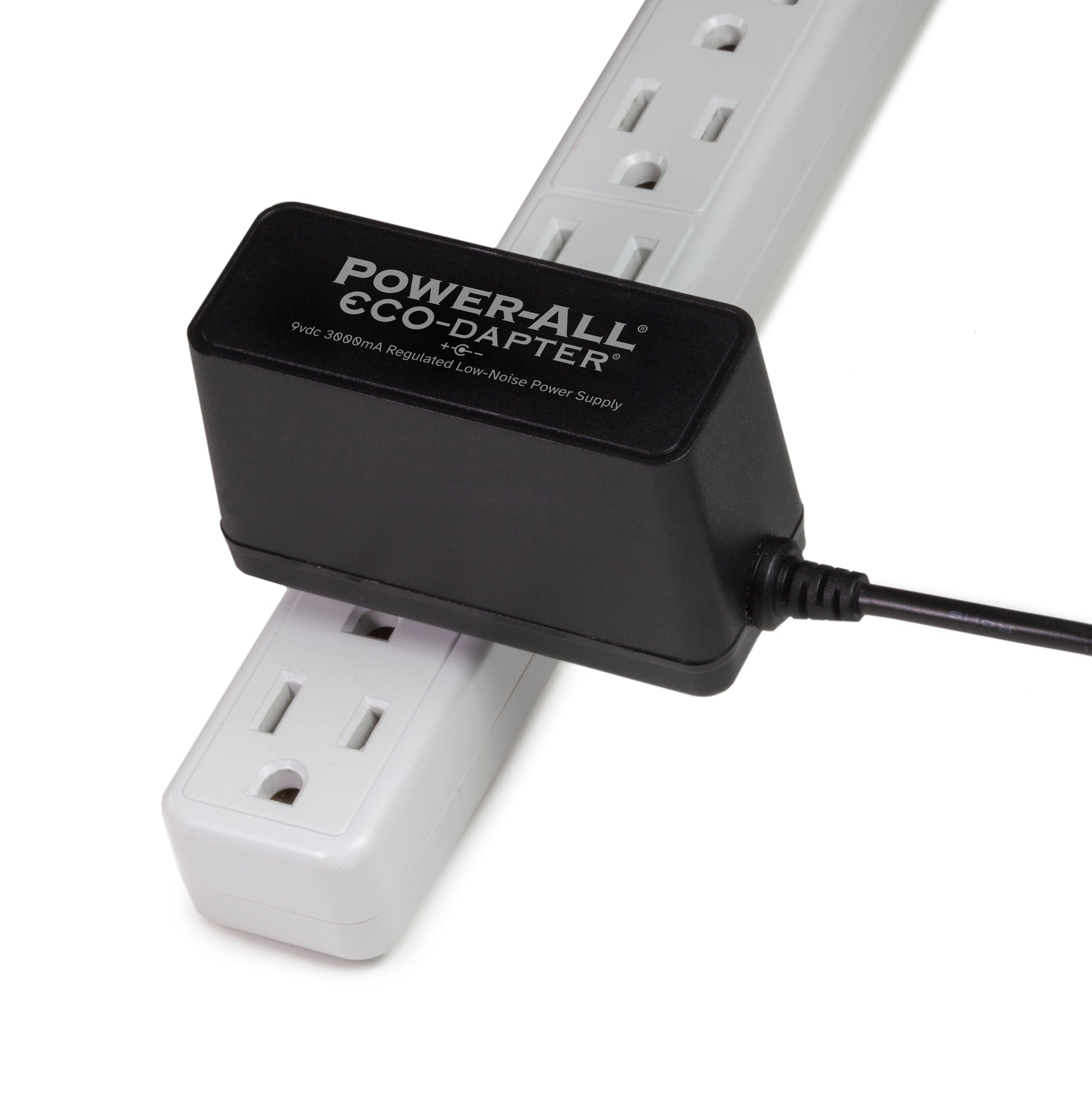 Power-All ECO-Dapter 3000mA 9vdc Power Supply for Guitar Effect Pedals plugged into one spot on a power strip