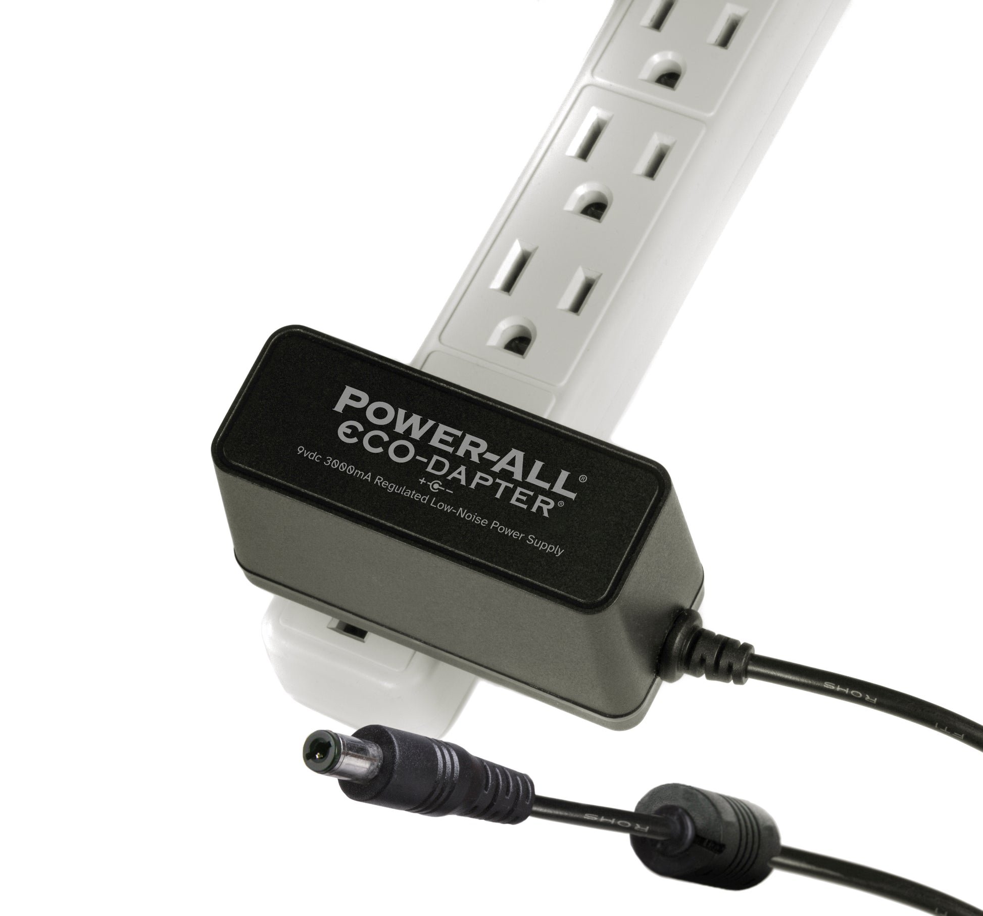 Power-All ECO-Dapter 3000mA 9vdc Power Supply for Guitar Effect Pedals plugged into one spot on a power conditioner