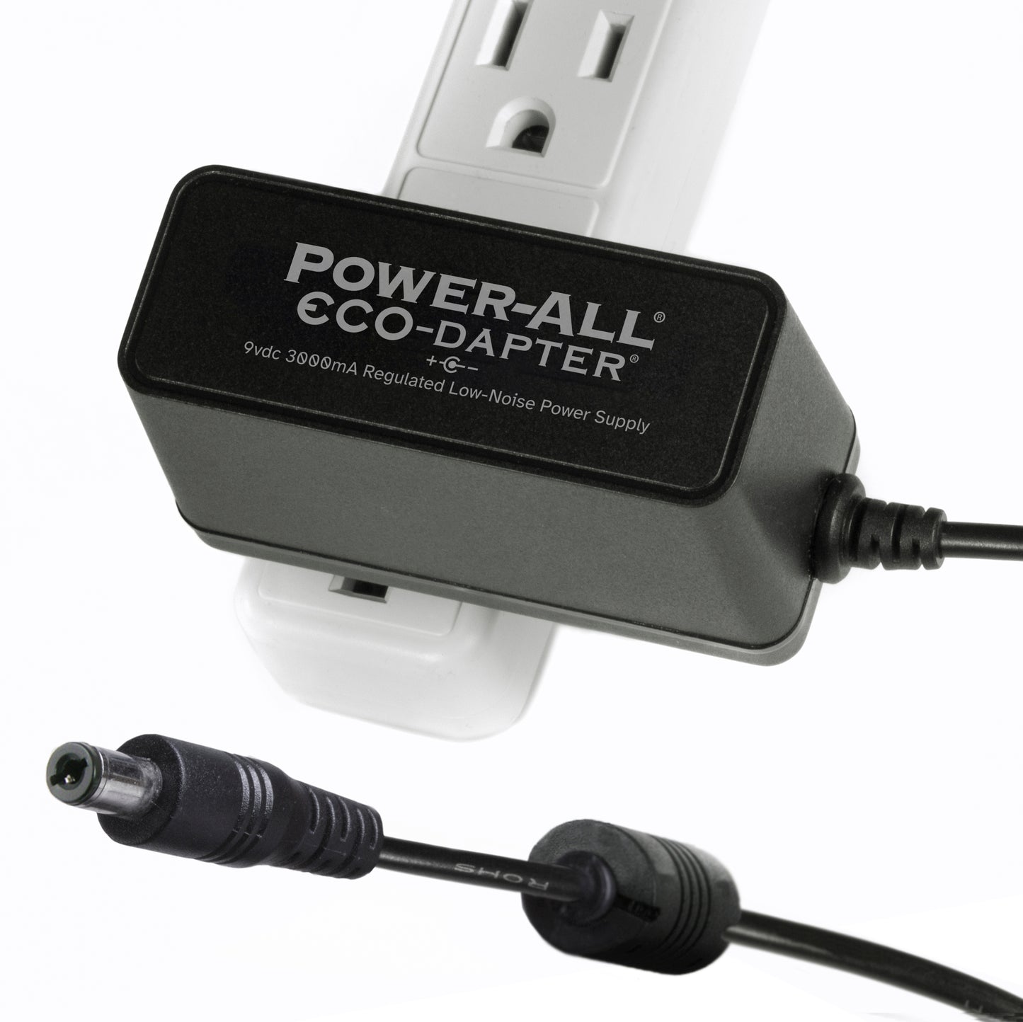 Power-All ECO-Dapter 3000mA 9vdc Power Supply for Guitar Effect Pedals plugged into one spot on a power strip